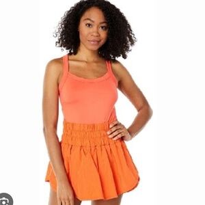 Free People Bright Orange Workout Romper